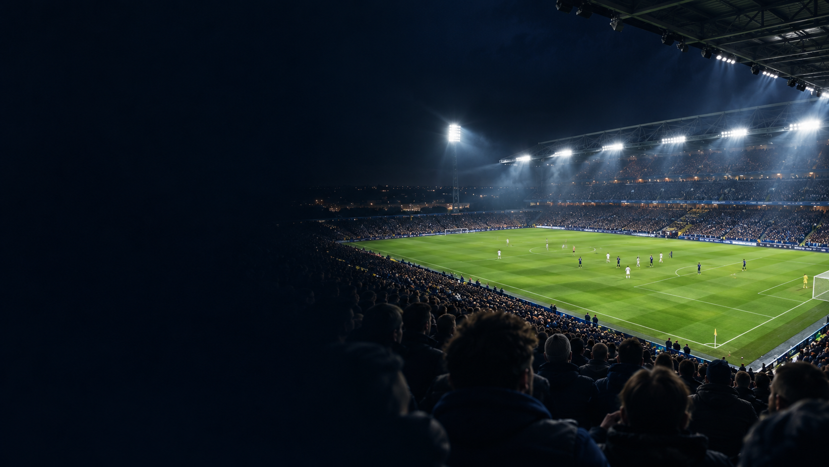 Night football stadium under floodlights with space for editorial text